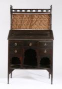 Attributed to Liberty & Co. Arts and Crafts 'Medina' bureau bookcase of Moorish style, after a