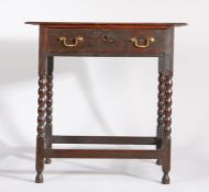 18th Century oak side table, the rectangular top above a single frieze drawer and turned legs united