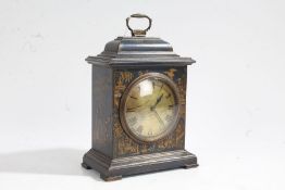 Blue Chinoiserie table/mantle clock, the brass dial with Roman numerals on a blue body decorated
