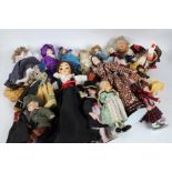 A large collection of 20th century dolls some bisque headed dolls together with various others to