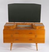 Mid 20th century dressing table, the oblong mirror above two small and two long drawers with