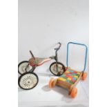 Child's Mobo tricycle, together with a pul-along wagon with coloured building blocks (2)