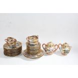 Japanese eggshell teaset, decorated with figures in landscapes on a gilt ground (qty)