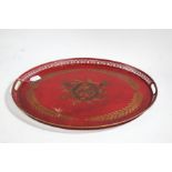 French toleware style tray, the red tray with pierced border and central field decorated with gold