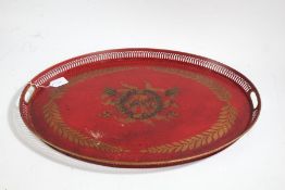 French toleware style tray, the red tray with pierced border and central field decorated with gold