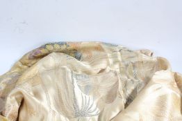 Large golden silk cloth, woven with a religious scene, with tasseled edges, approx. 234cm long,