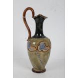 Royal Doulton stoneware ewer, the baluster shaped ewer with long slender neck in dark green glaze,