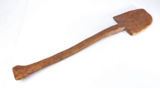 A late 18th/early 19th century wooden spade, probably beech, with slightly arched blade, unusual
