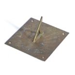 20th Century brass sundial, the pierced brass gnomon above a square base plate with cast Roman