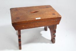 Victorian mahogany stool, the rectangular top with a pierced motif to the center raised on cut