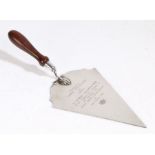 Silver plated presentation trowel, the turned wooden handle above shaped blade engraved "Presented