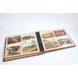 Chinese black lacquered and mother of pearl postcard album, with contents of coloured postcards