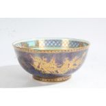 A Wedgwood dragon lustre bowl with mottled glaze, gilt and painted dragons to interior and