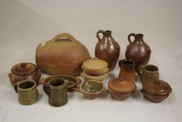 Collection of Muchelney Pottery kitchen wares, to include jugs, pots and covers, mugs, dishes,
