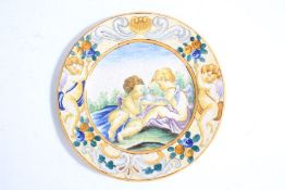 18th Century Italian maiolica plate, Castelli, the central ground with depiction of two cherubs