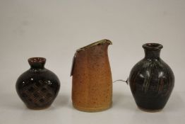 Two Muchelney Pottery squat vases with incised line decoration, 13cm and 9.5cm high, Muchelney