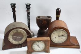 Collection of works of art to include two 20th century mantle clocks, pair of metal candle sticks,