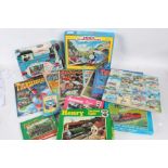 Collection of Thomas the Tank Engine puzzles, a Thunderbirds puzzle and six editions of Shoot