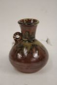John Leach for Muchelney Pottery, a squat vase with tapering neck, loop handle and bulbous body, the