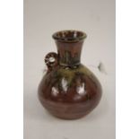 John Leach for Muchelney Pottery, a squat vase with tapering neck, loop handle and bulbous body, the