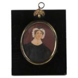 English School (19th century) Miniature portrait of an elderly lady, oval, painted on card, in