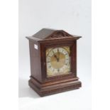 Winterhalder & Hofmeier oak bracket or table clock, the gilt dial with a silvered chapter ring and