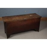19th century elm coffer, the rectangular top opening to reveal a candle box set on cut away ends,