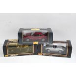 Three Maisto boxed models, to include a Porsche 550 A Spyder, BMW 850i, and BMW 502, all 1:18 (3)