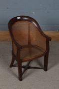 Victorian mahogany and cane child's chair, with a arched back and a cane back and seat raised on