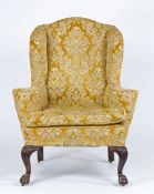 Victorian wingback chair, the yellow foliate and scroll upholstered chair with loose seat cushion,