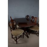 George III style mahogany twin pedestal dining table together with a set of six Hepplewhite style