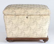 Victorian upholstered ottoman, the rectangular top opening to reveal a storage compartment, with