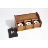 Victorian oak inkwell, with three sliding compartments housing the wells, 22cm wide, portrait