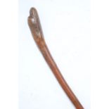 Carved wooden folk art waking stick, with birds head handle, 79cm long