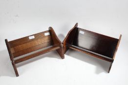 Two 20th century book troughs, to include a adjustable oak example and a mahogany example (2)