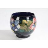 Large Moorcroft bowl, with a blue ground decorated with flowers and leaves, 15.5cm diameter
