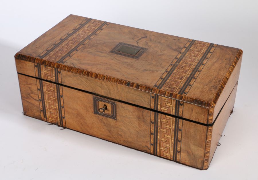 A large Victorian Walnut parquetry inlaid writing box, the hinged lid with central brass cartouche