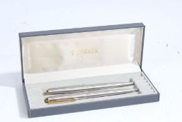 Parker stainless steel pen and pencil, housed within a Parker box
