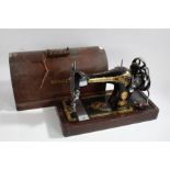 20th century Singer sewing machine, No Y9317361, housed within a wooden case