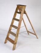 A set of painted pine decorator's folding ladders, six step, 132cm high.