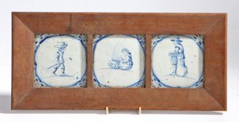 Three 18th century Delft blue & white figural tiles, framed as one, 21.5cm x 47cm.