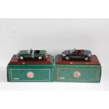 Two Corgi 1:18 scale models, the first an MG MGF 1.8i VVC Roadster in black, the second a 1963 MGB