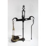 Large cast iron set of scales together with weights, 76cm high