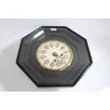 Victorian ebonised octagonal wall clock, having alabaster face with blue and white enamelled roman