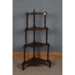 Victorian four-tier mahogany whatnot, with shaped tiers and spiral turned supports raised on