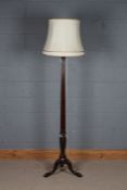 A mahogany standard lamp, in the Hepplewhite manner on cabriole legs