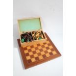 Jaques of London wooden chess board, together with a carved boxwood chess set (32 pieces)