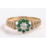9 carat gold paste and green stone ring, the head in the form of a flower set with a central round