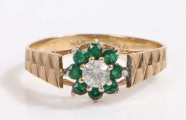9 carat gold paste and green stone ring, the head in the form of a flower set with a central round