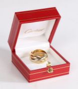 A Cartier Trinity ring, in 18 carat white, yellow and rose gold, signed Cartier, dated 1997, 13.6